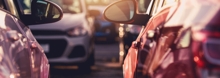 Close Up Of Fleet Of Variety Of Passenger Vehicles At Dealership Outdoor Parking Lot.