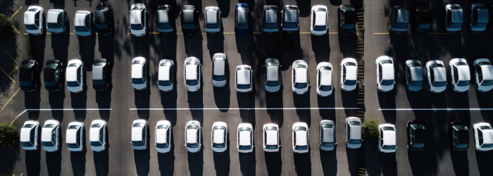 Abundance of cars in crowded parking lot generated by artificial intelligence